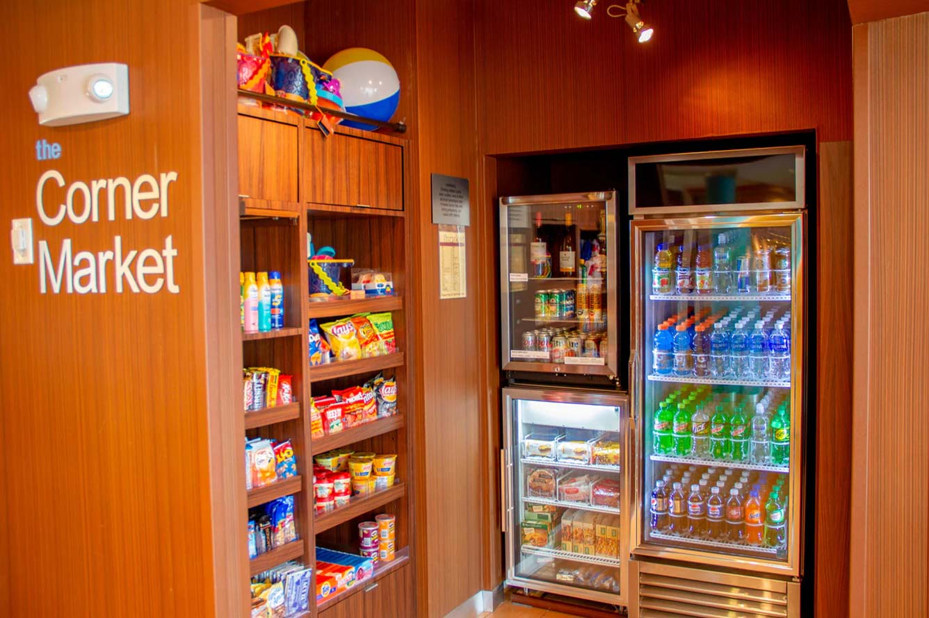 Small convenience store at Wavecrest Lodge with snacks, drinks, and coolers near the beach hotel.