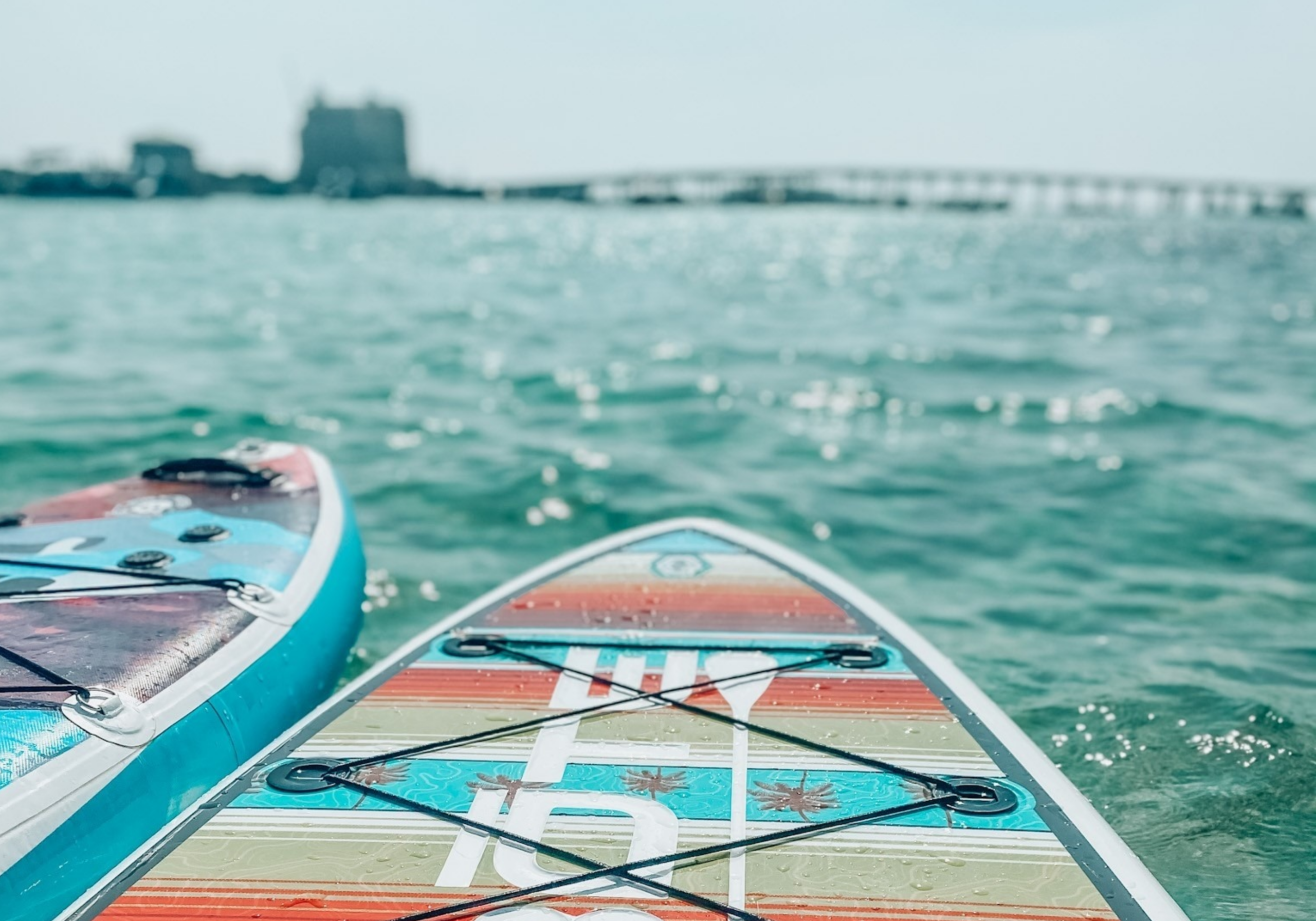 Paddleboard and SUP rentals on clear water near Crab Island Destin Florida