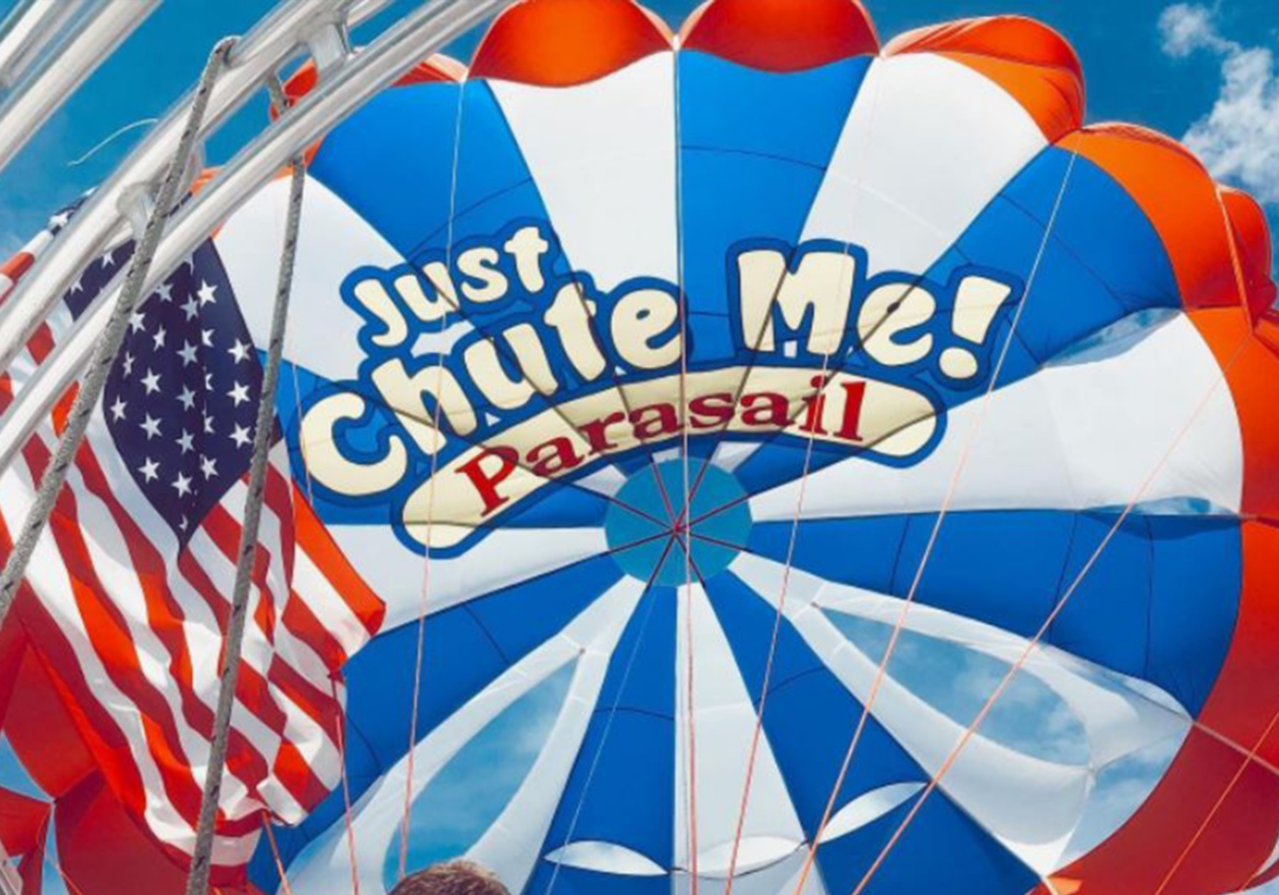 Parasailing with Just Chute Me in Destin Florida over the Gulf with clear turquoise water