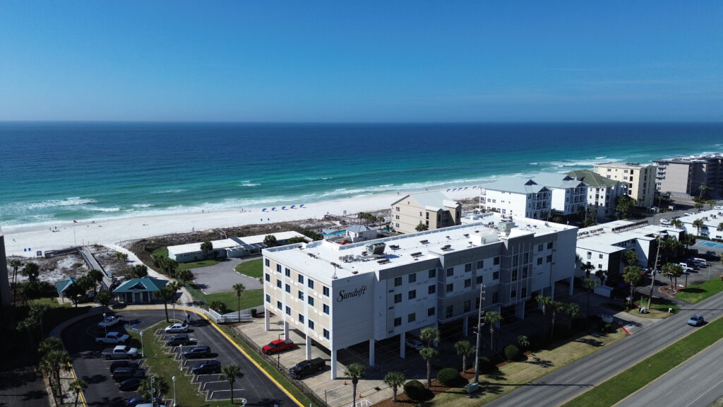 Sundrift beachfront hotel on Okaloosa Island near Destin Florida overlooking the Gulf with white sand beaches and emerald water in Fort Walton Beach