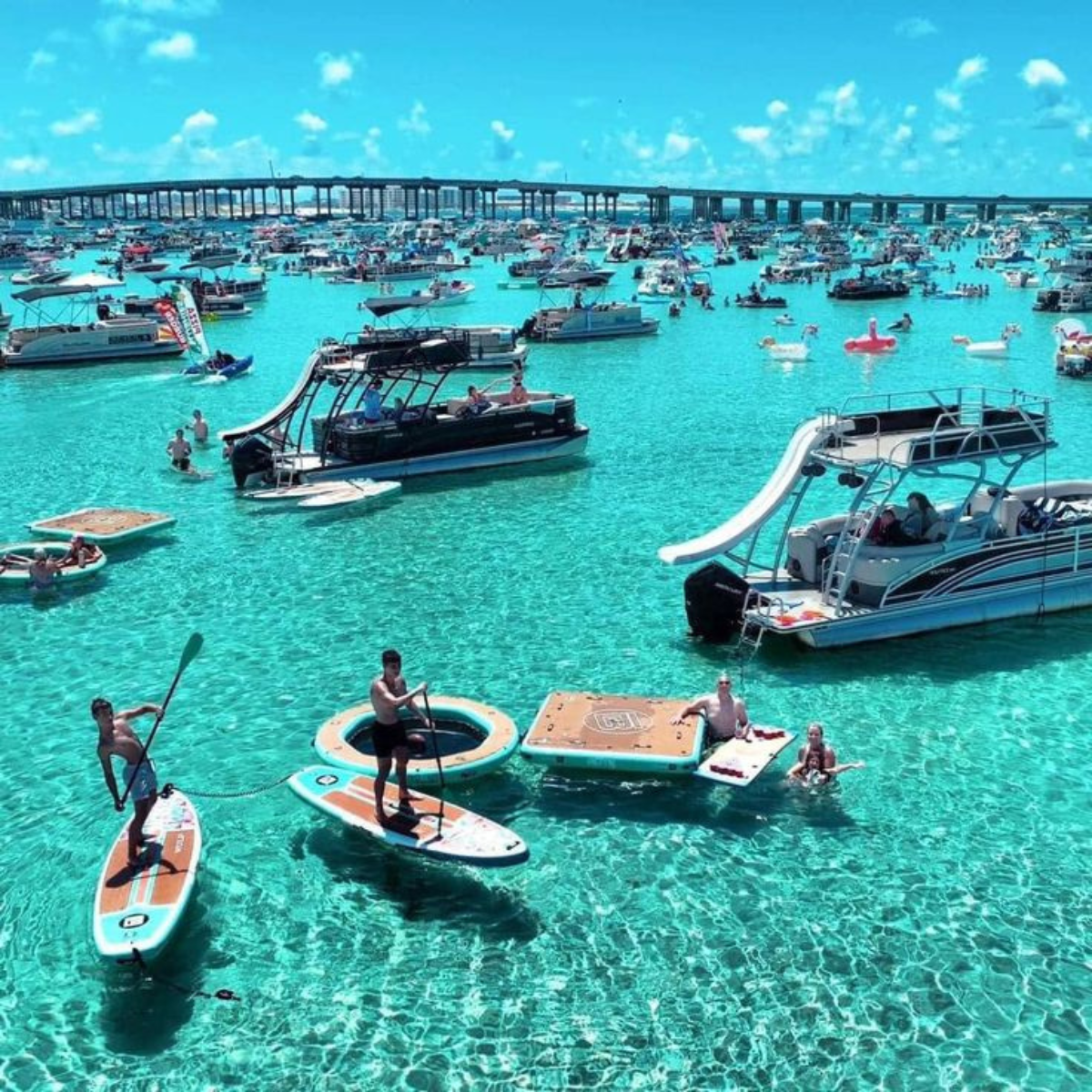 Crab Island sandbar in Destin Florida with boats and clear water on the Emerald Coast
