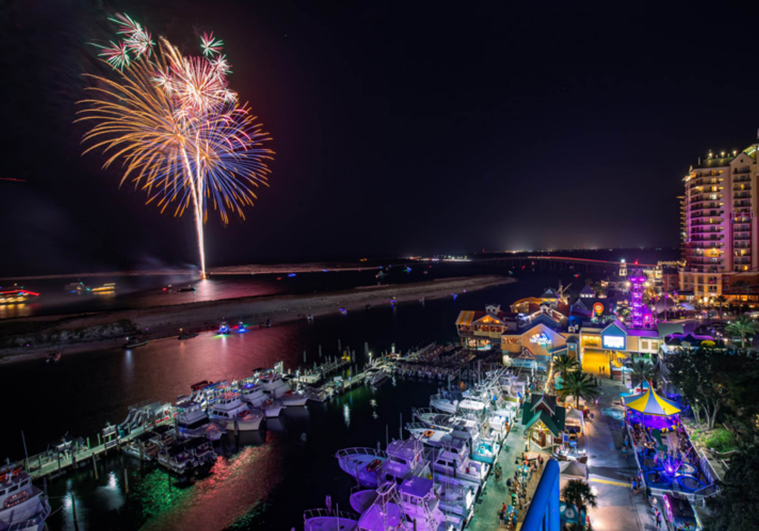 Fireworks display in Destin Florida over the harbor during local events on the Emerald Coast