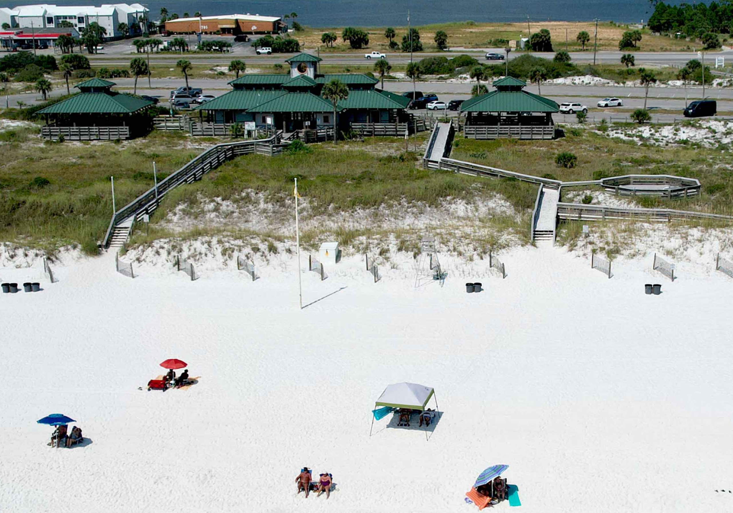 John Beasley Park on Okaloosa Island with beach access, clear water, and people relaxing near the shore