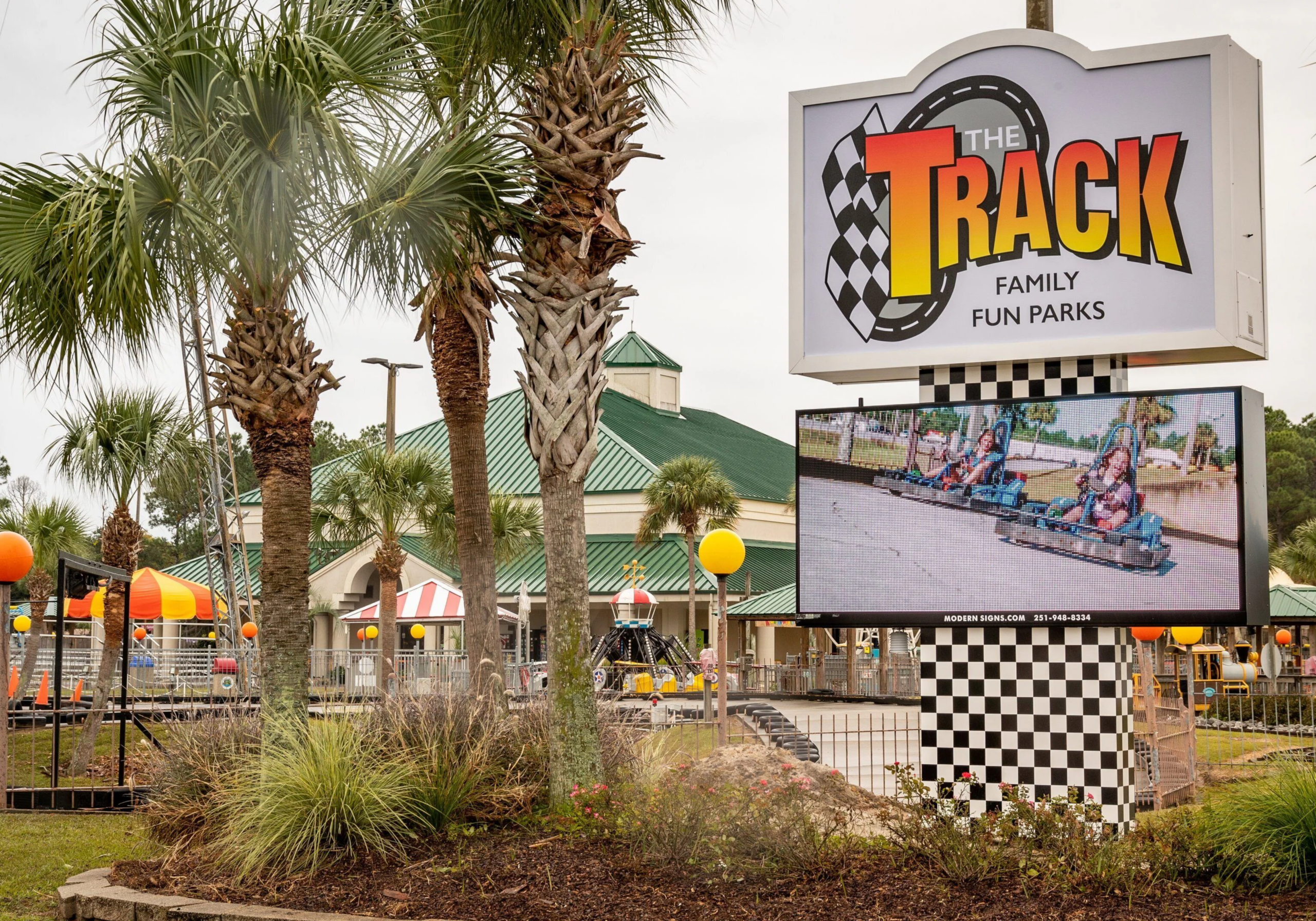 The Track Family Fun Park in Destin featuring go-karts, mini golf, and kid-friendly rides