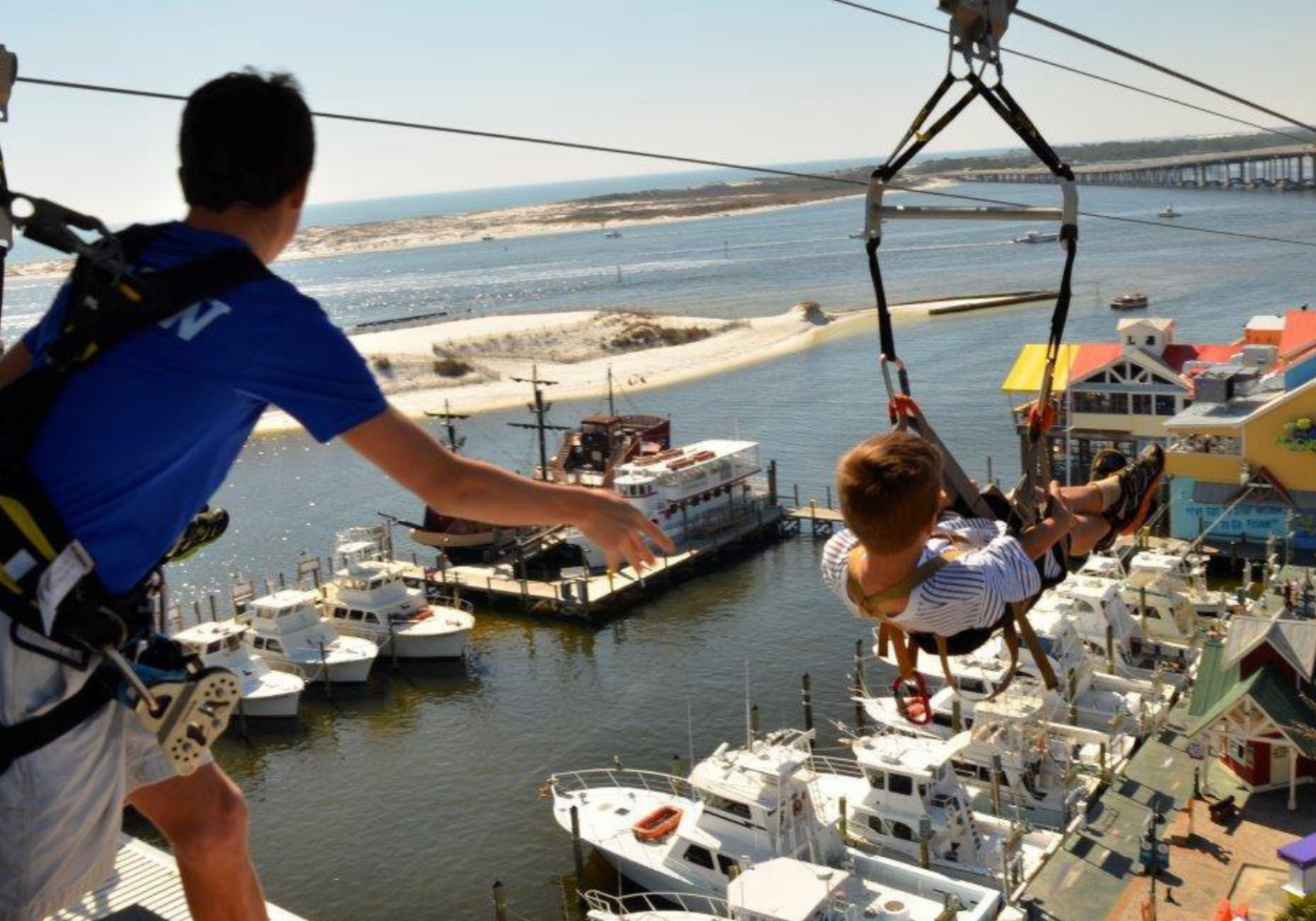Zipline at Destin Harbor Boardwalk overlooking the harbor and waterfront attractions
